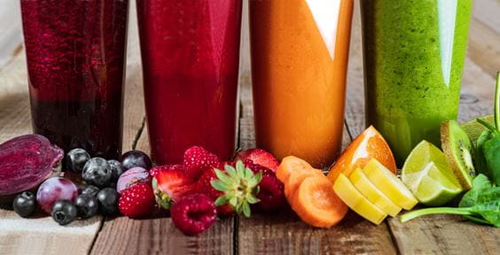 Fruits and juice on table